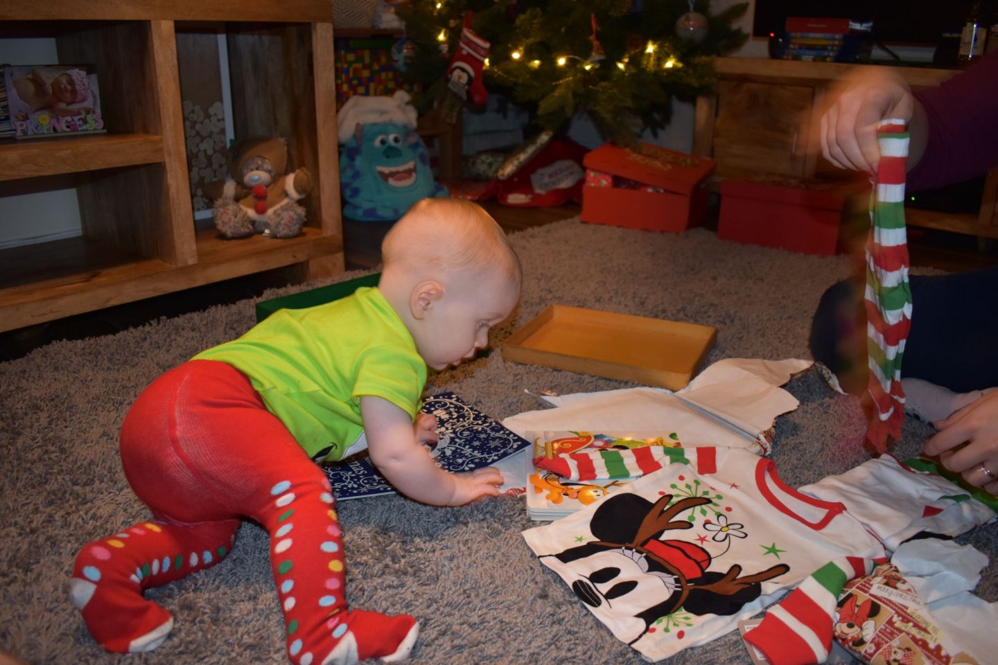 Opening our Christmas Eve boxes with our baby