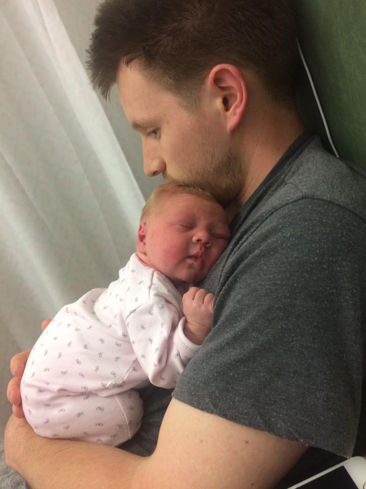 me holding Isabelle in the hospital. Luckily we've never actually had colic
