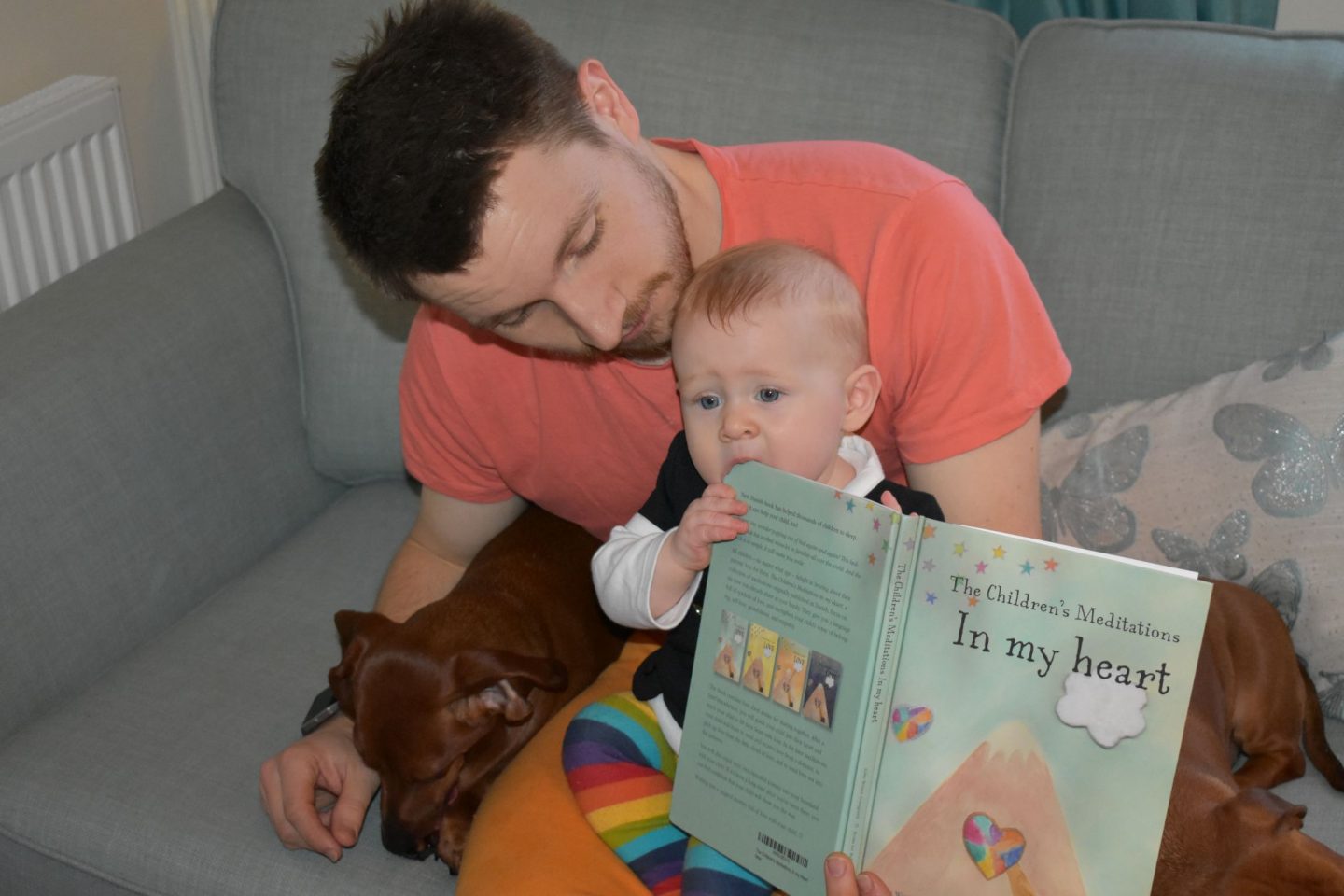 Our baby chewing The Children's Meditation in My Heart