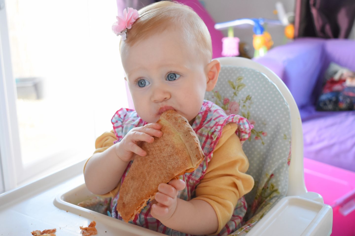 NationalPizzaDay 2018 with a baby eating pizza