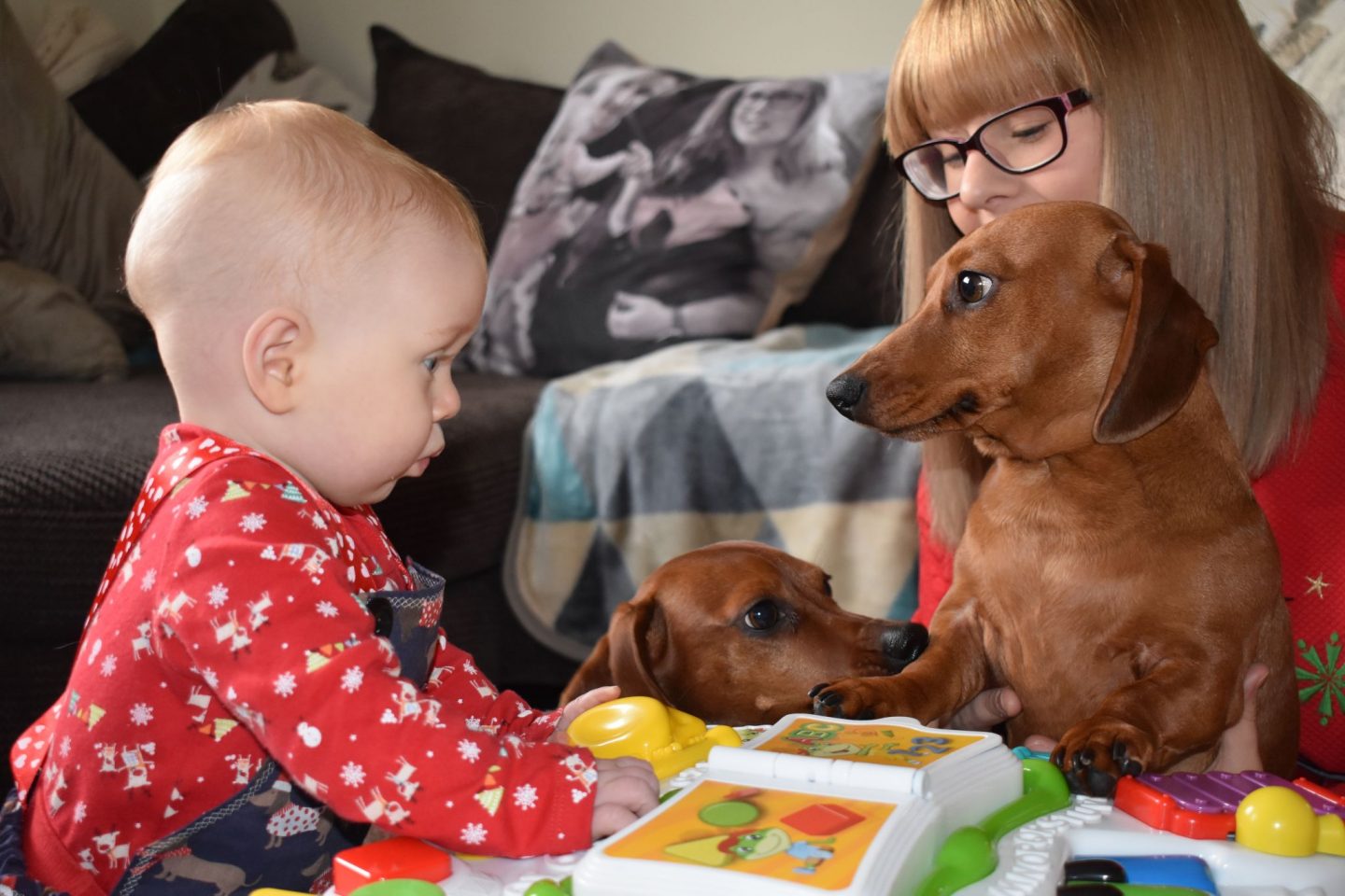 Activity table being used by the baby and the family