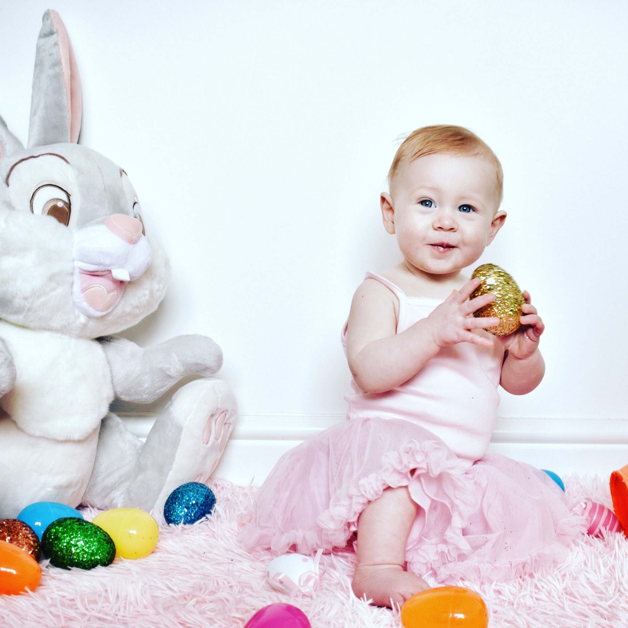 Our baby girl in pink for an Easter themed photo shoot