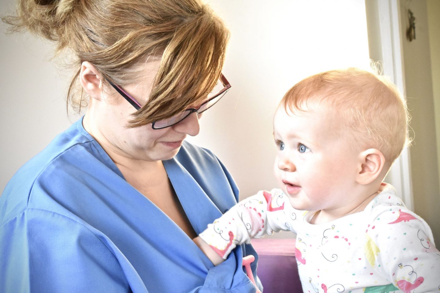 My wife having her boobs examined by a toddler