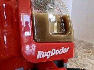 The water at the end of using the Rug Doctor portable spot cleaner